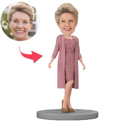 Frau Trägt Ein Grau-Violettes Kleid Mit Blumenmuster Benutzerdefinierte Wackelköpfe