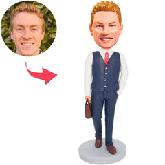 Blauer Anzugs-Geschäftsmann mit einer Tasche Kundenspezifische Bobbleheads addieren Text