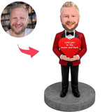 Mann mit Fliege hält Liebesherz Kundenspezifische Bobbleheads