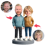 Modepaar trägt Kapuzenpullover Kundenspezifische Bobbleheads