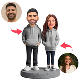 Paar trägt graue Paar Hoodies Kundenspezifische Bobbleheads