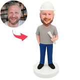 Engineering-Teamleiter mit Blaupausen Kundenspezifische Bobbleheads mit graviertem Text Tragen Sie einen Schutzhelm