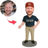 Trainer zeigt auf den Boden Benutzerdefinierte Bobbleheads