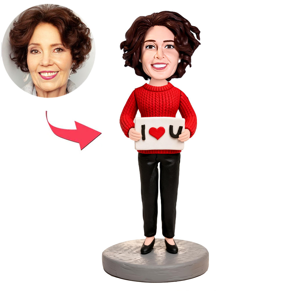 Eine Frau hielt ein Schild hoch, auf dem sie ihre Liebe zum Ausdruck brachte Benutzerdefinierte Bobbleheads