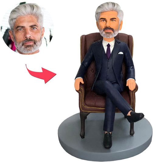 Kundenspezifischer Bobbleheads Mann sitzt im Chefsessel