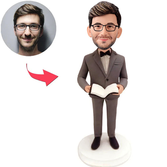 Männlicher Professor, der ein Buch hält Kundenspezifische Bobbleheads addieren Text
