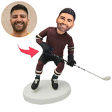 Eishockeyspieler im braunen Anzug Kundenspezifische Bobbleheads addieren Text